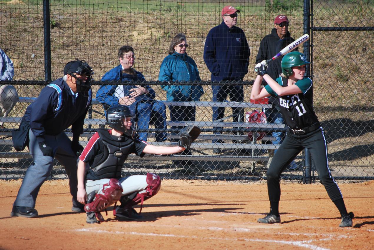 Softball Picks Up First Win of 2014 in Doubleheader Split
